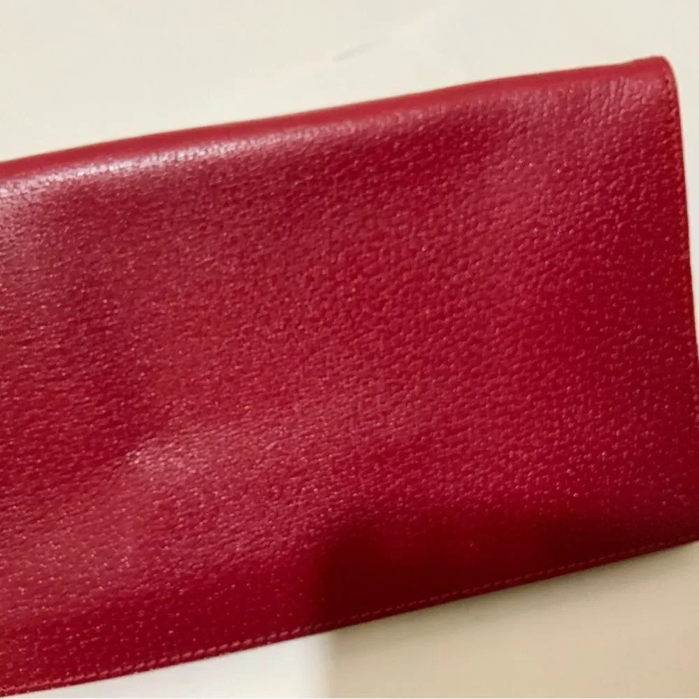 NWOT Aspinal of London red reptile cosmetic case.